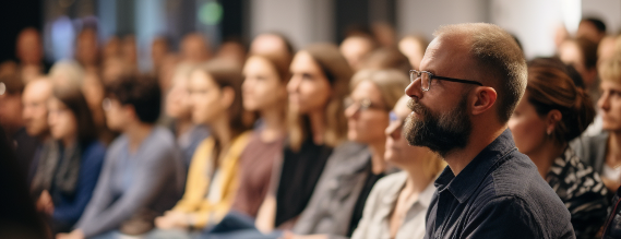 Foto af tilhørere til konference