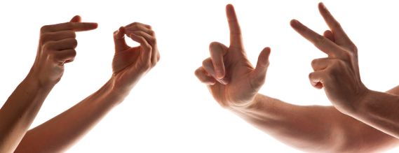 To par hænder, der tilsammen danner ordet TOLK med håndalfabetet